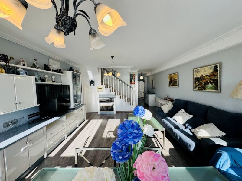 Living room in penthouse for sale in La Mata