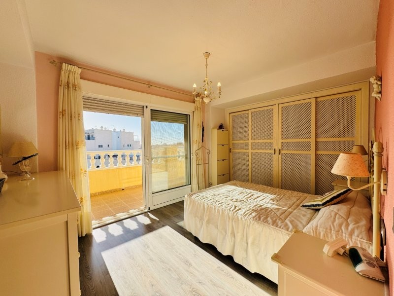Master bedroom in penthouse for sale in La Mata