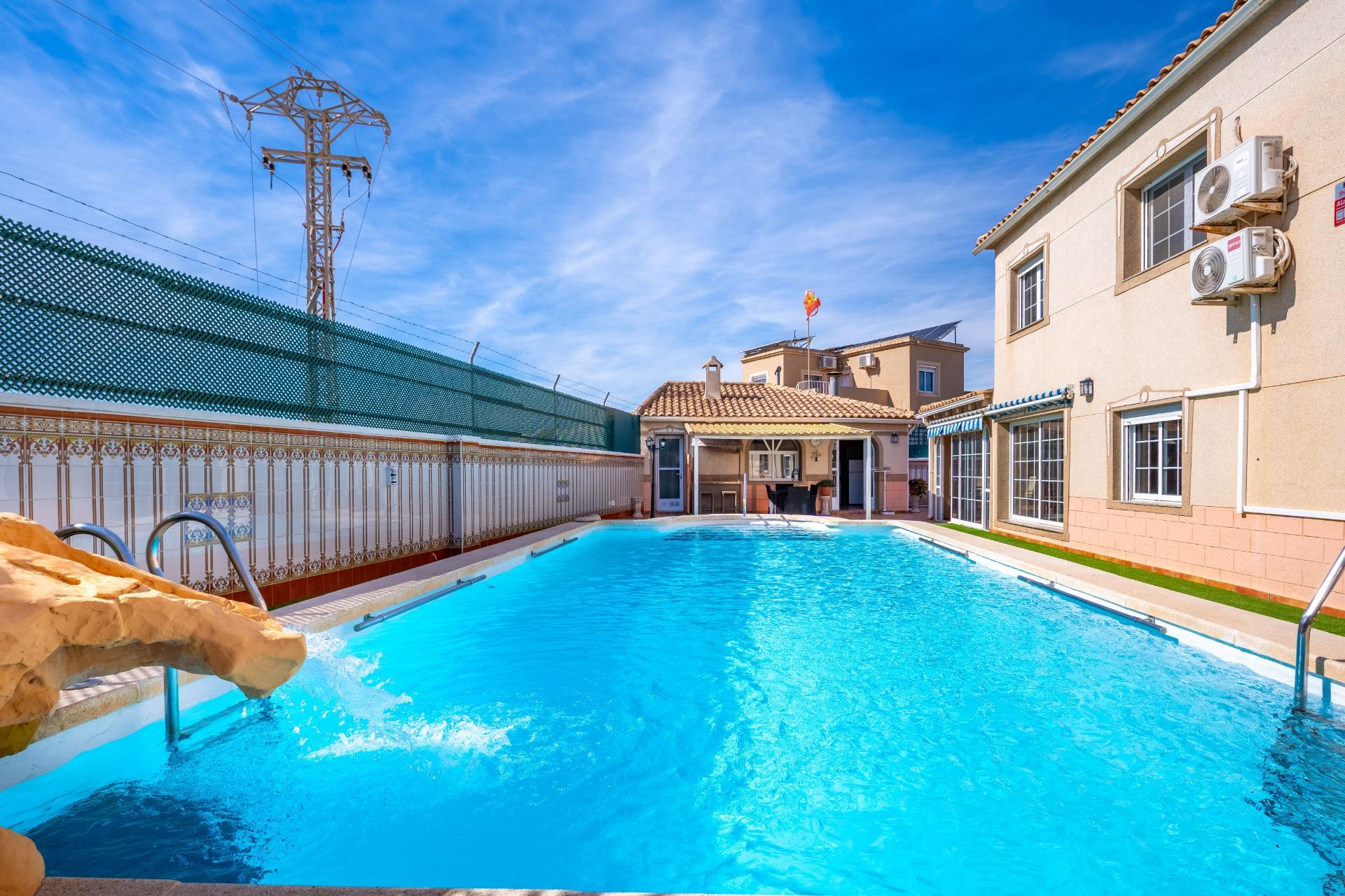 Pool area in villa for sale in Torrevieja