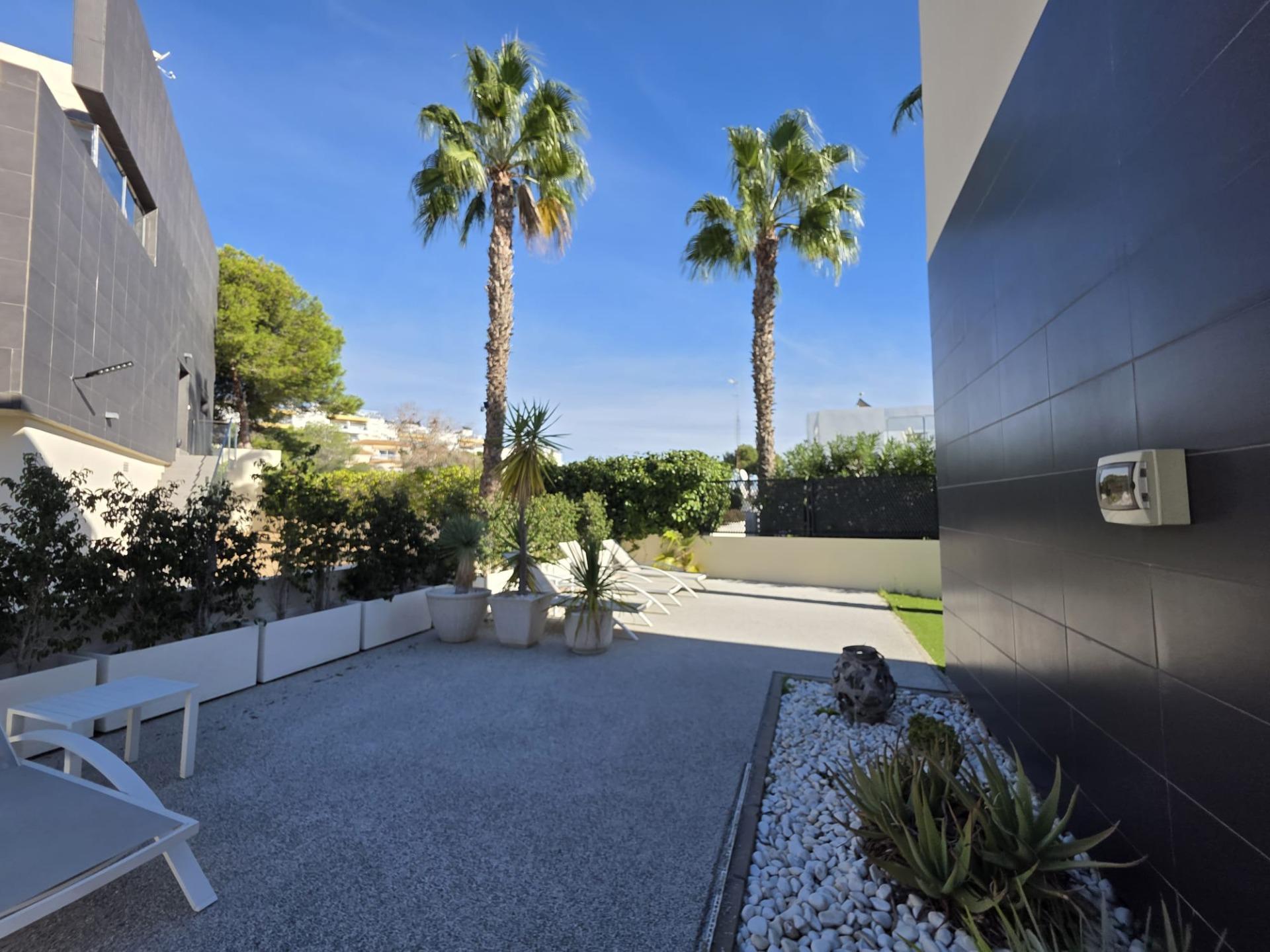 Pool area in villa for sale in Orihuela Costa