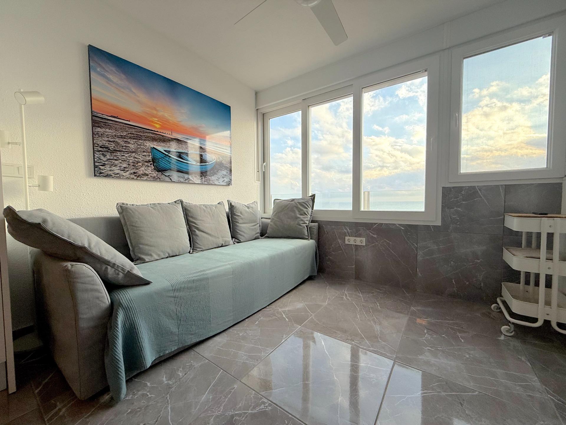 A rare opportunity to purchase a fully renovated apartment on the front line of the sea in one of th