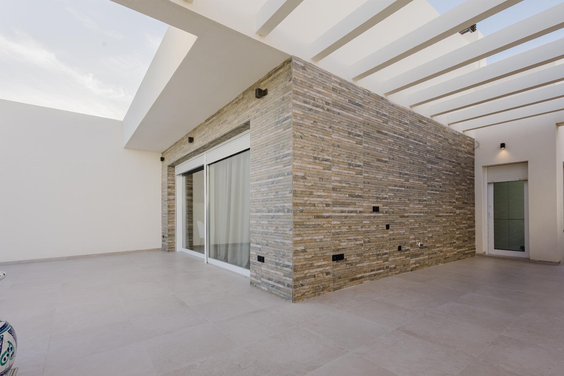 Pool area in villa for sale in Algorfa