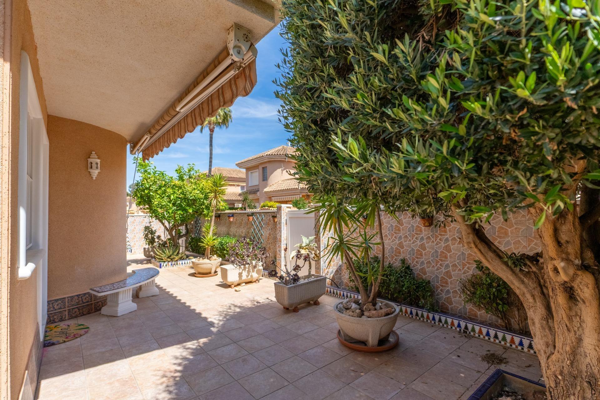 Pool area in villa for sale in Torrevieja