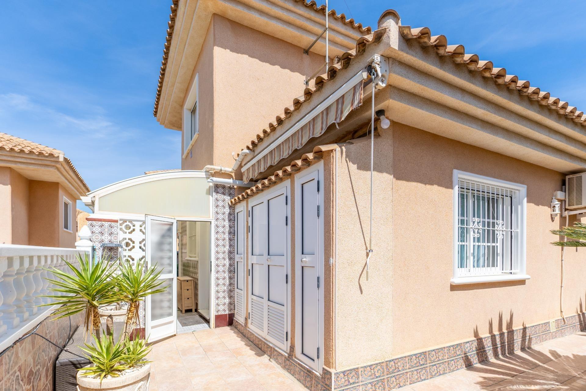 Pool area in villa for sale in Torrevieja