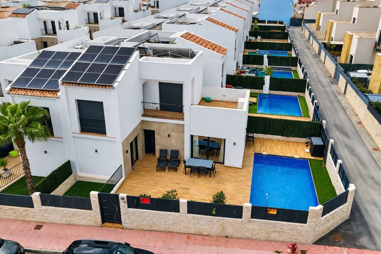 This contemporary semi-detached villa, completed in 2024, is offered for sale as an exceptional resa