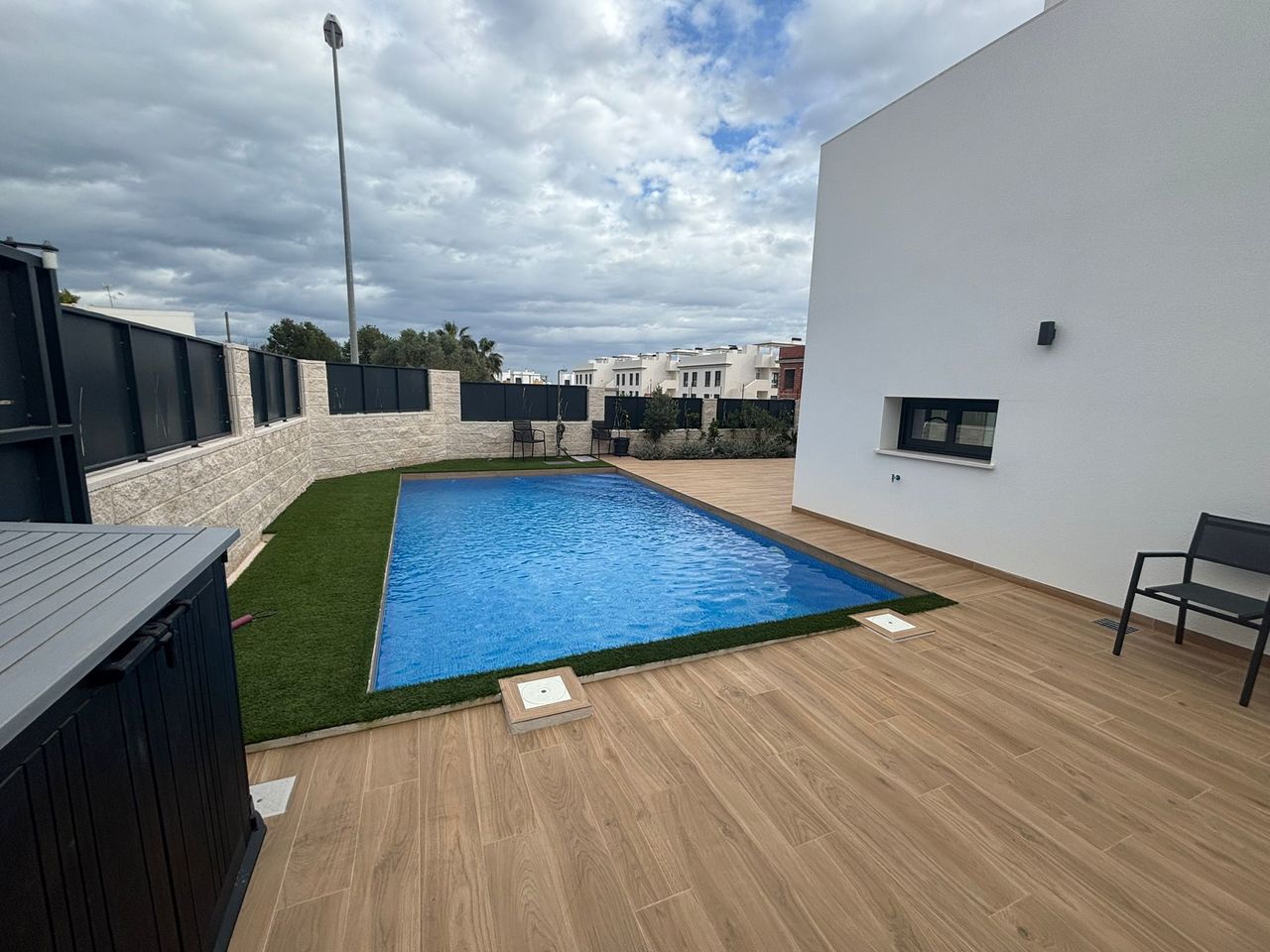 This contemporary semi-detached villa, completed in 2024, is offered for sale as an exceptional resa