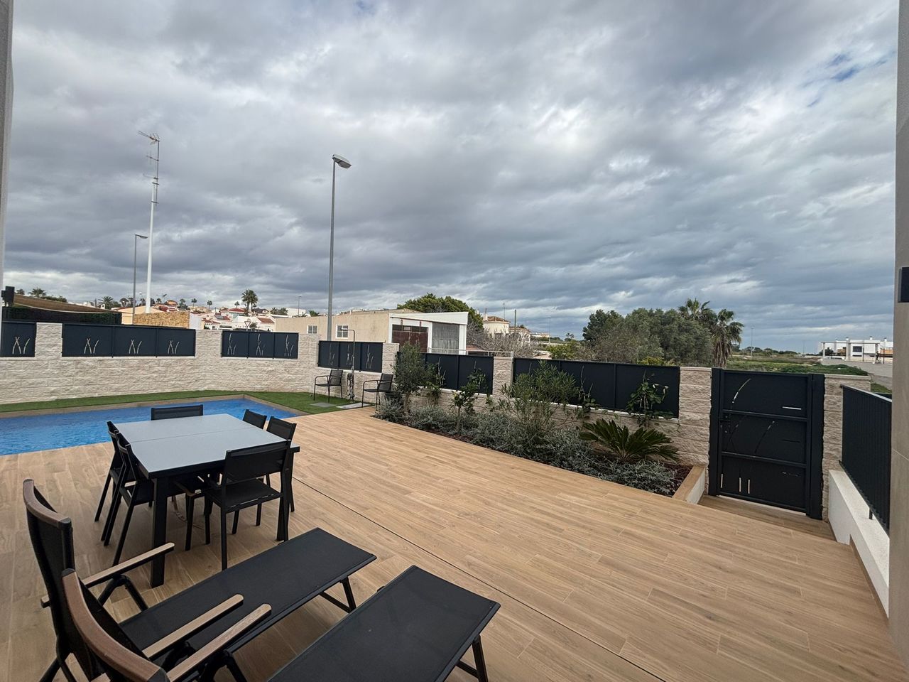 This contemporary semi-detached villa, completed in 2024, is offered for sale as an exceptional resa