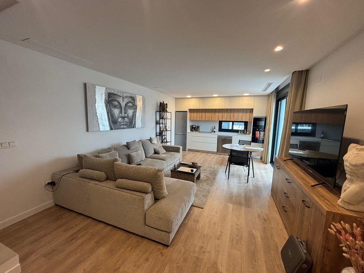 This contemporary semi-detached villa, completed in 2024, is offered for sale as an exceptional resa