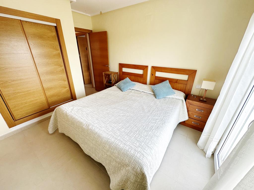 Master bedroom in apartment for sale in Hacienda Riquelme Golf Resort