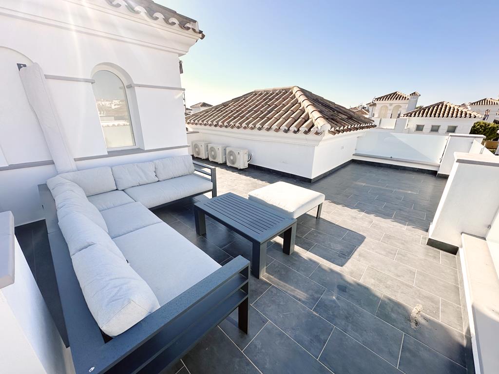 Terrace in villa for sale in La Torre Golf Resort