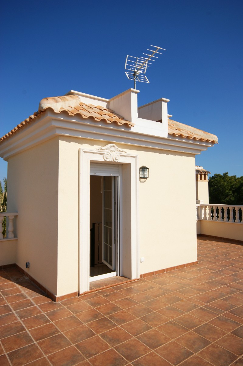 Pool area in villa for sale in Cabo Roig