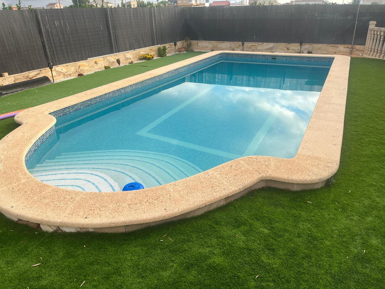 Pool area in villa for sale in Orihuela