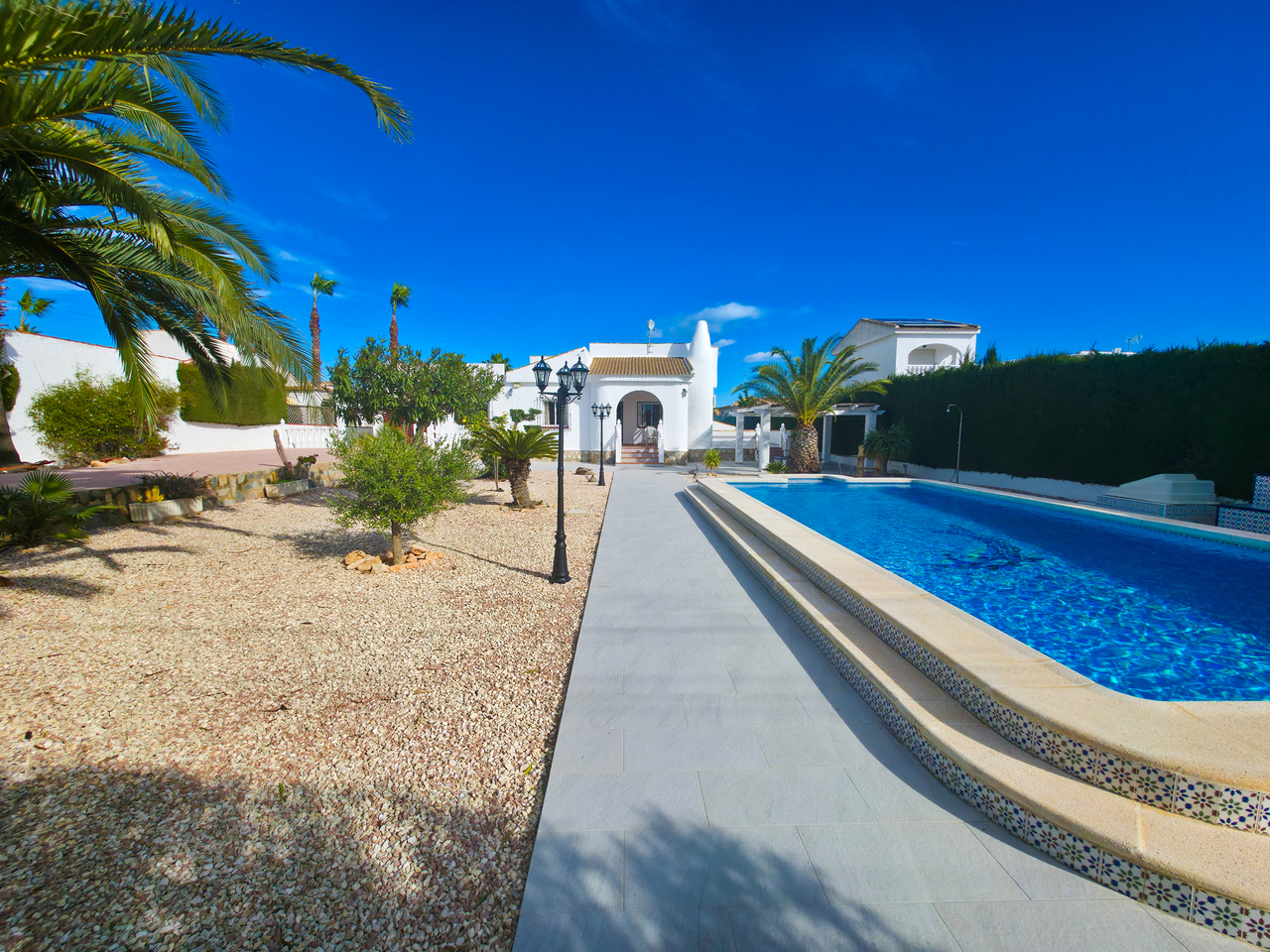 Pool area in villa for sale in Torrevieja