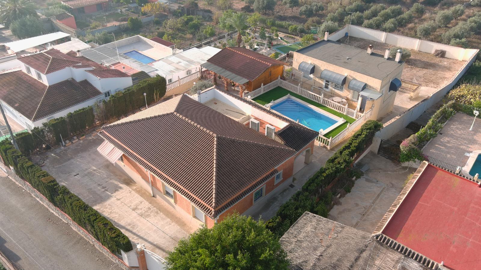 Pool area in villa for sale in Albatera