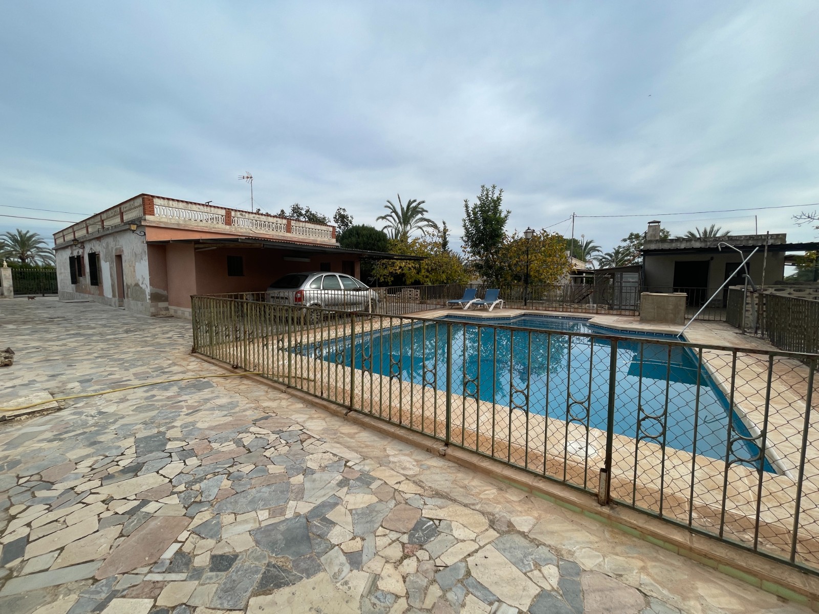 Pool area in villa for sale in Elche