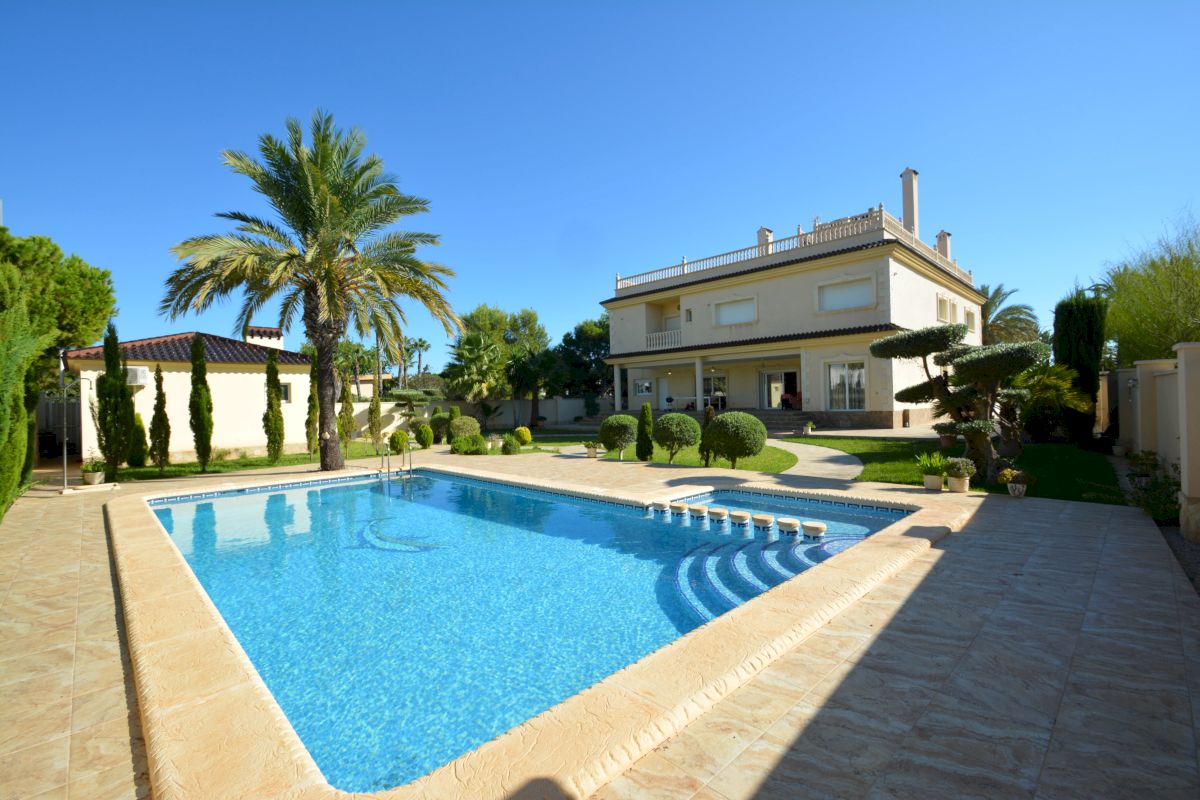 Pool area in villa for sale in Orihuela Costa