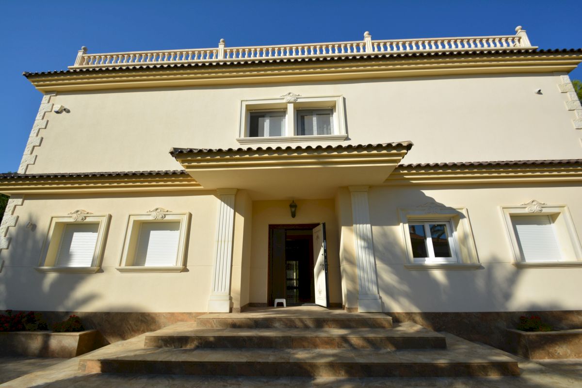 Pool area in villa for sale in Orihuela Costa