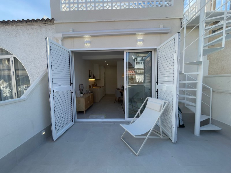Discover this beautifully fully renovated 2-bedroom, 1-bathroom bungalow, ideally situated on one le