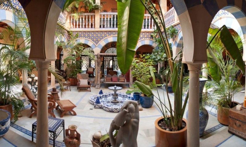 The villa is an Andalusia style house and has a total constructed surface of approx