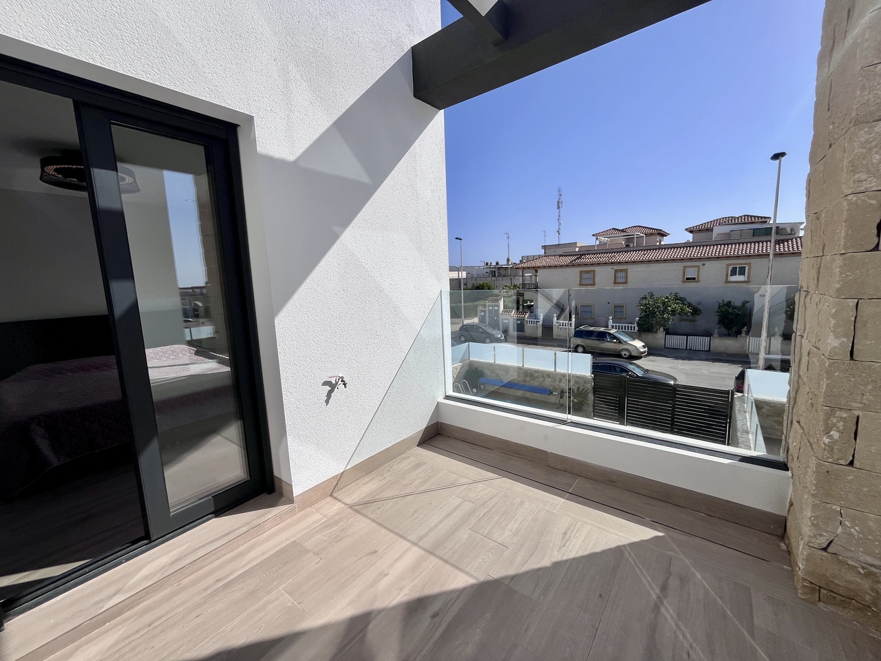 Pool area in villa for sale in Punta Prima