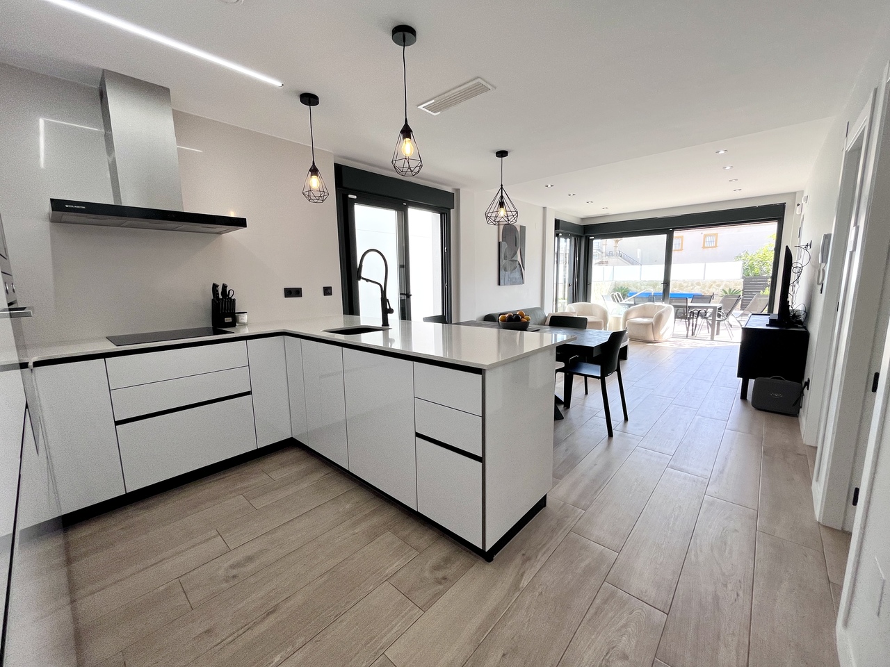 Experience modern coastal living at its finest in this exceptional resale new-build villa, perfectly