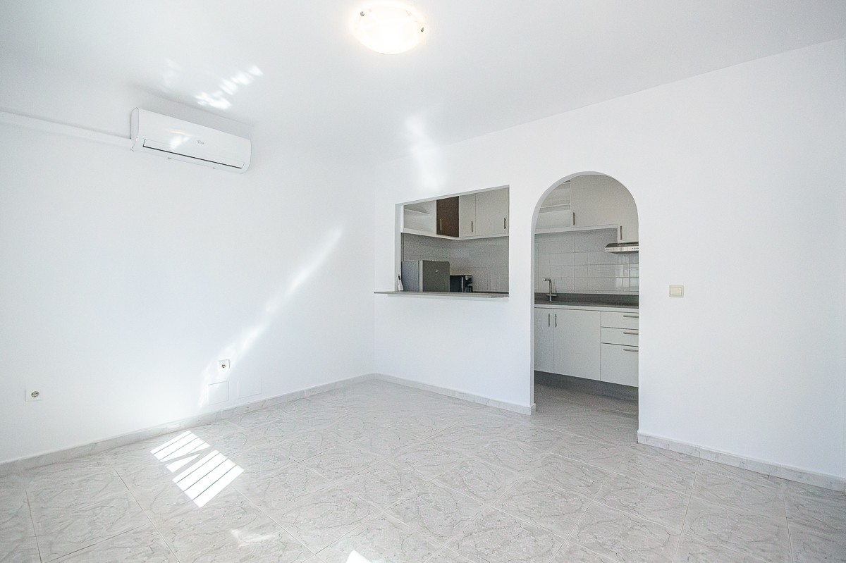 Discover this semi-renovated 3-bedroom, 2-bathroom townhouse in excellent condition, located just a