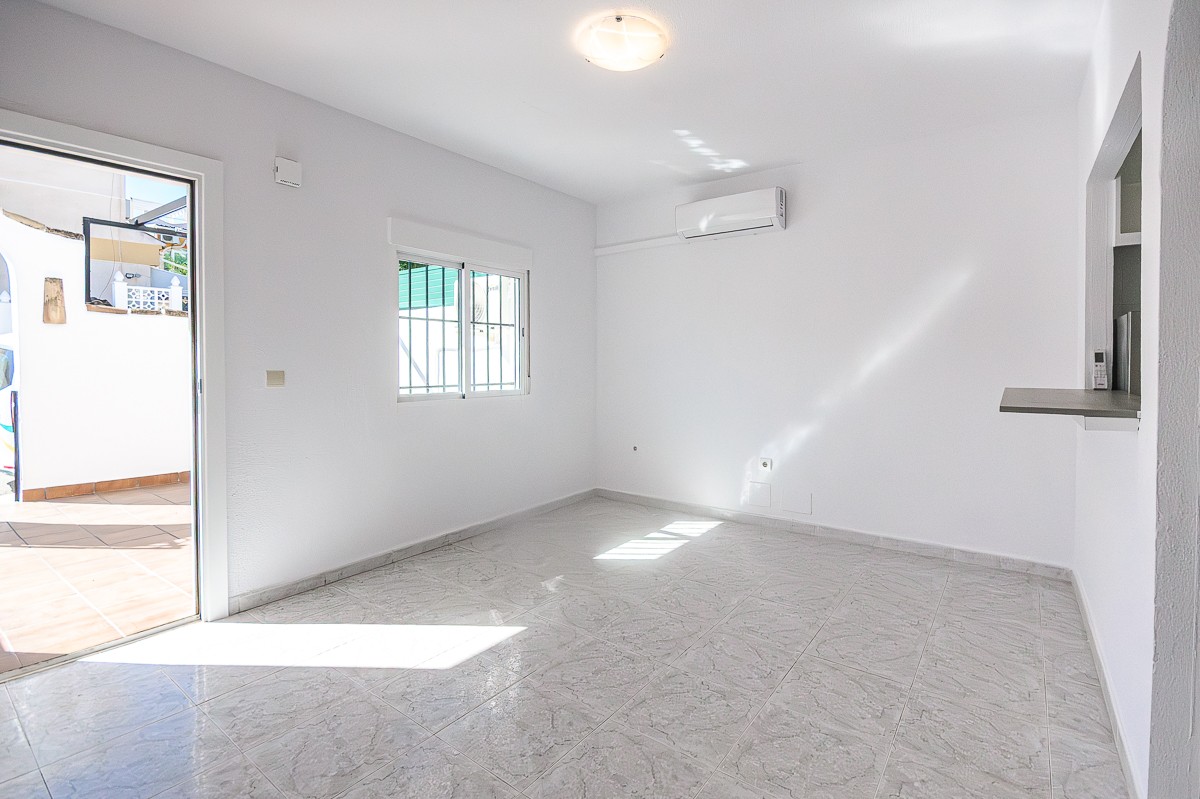 Discover this semi-renovated 3-bedroom, 2-bathroom townhouse in excellent condition, located just a