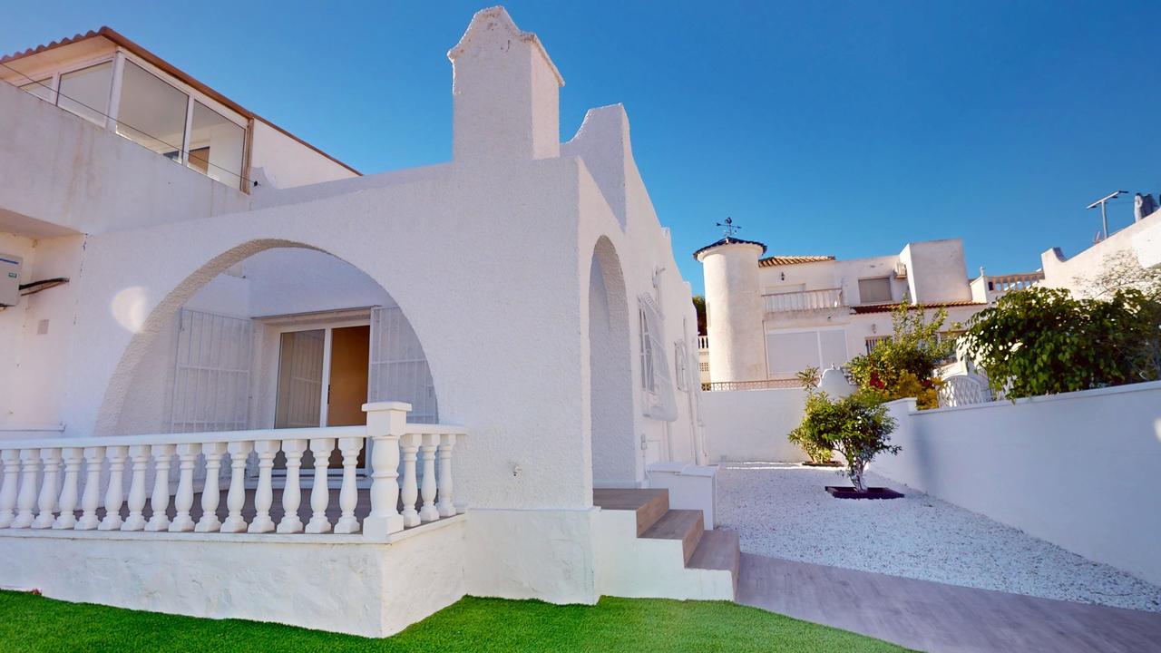 This charming renovated bungalow in Blue Lagoon offers a Mediterranean lifestyle in one of the quiet