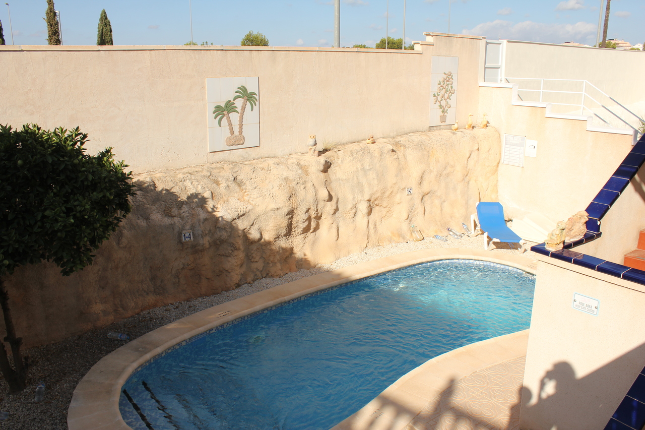 Pool area in villa for sale in La Zenia