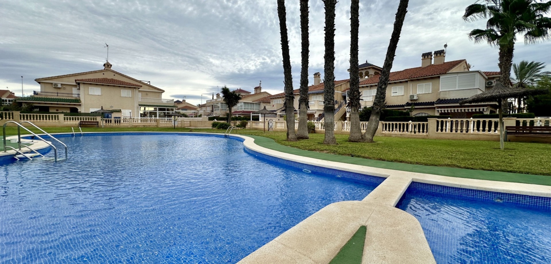 Pool area in apartment for sale in Orihuela Costa