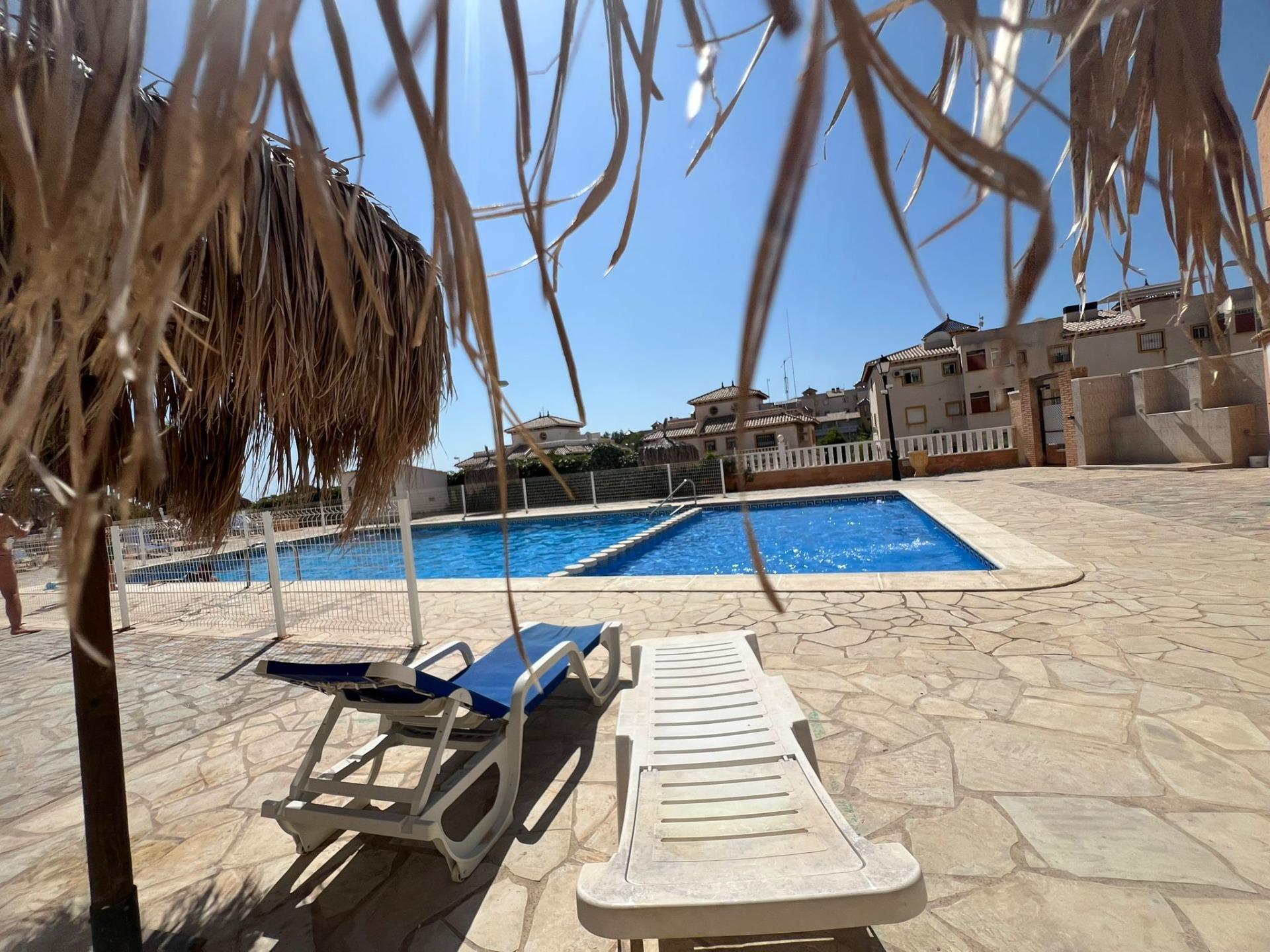 Pool area in apartment for sale in Orihuela Costa