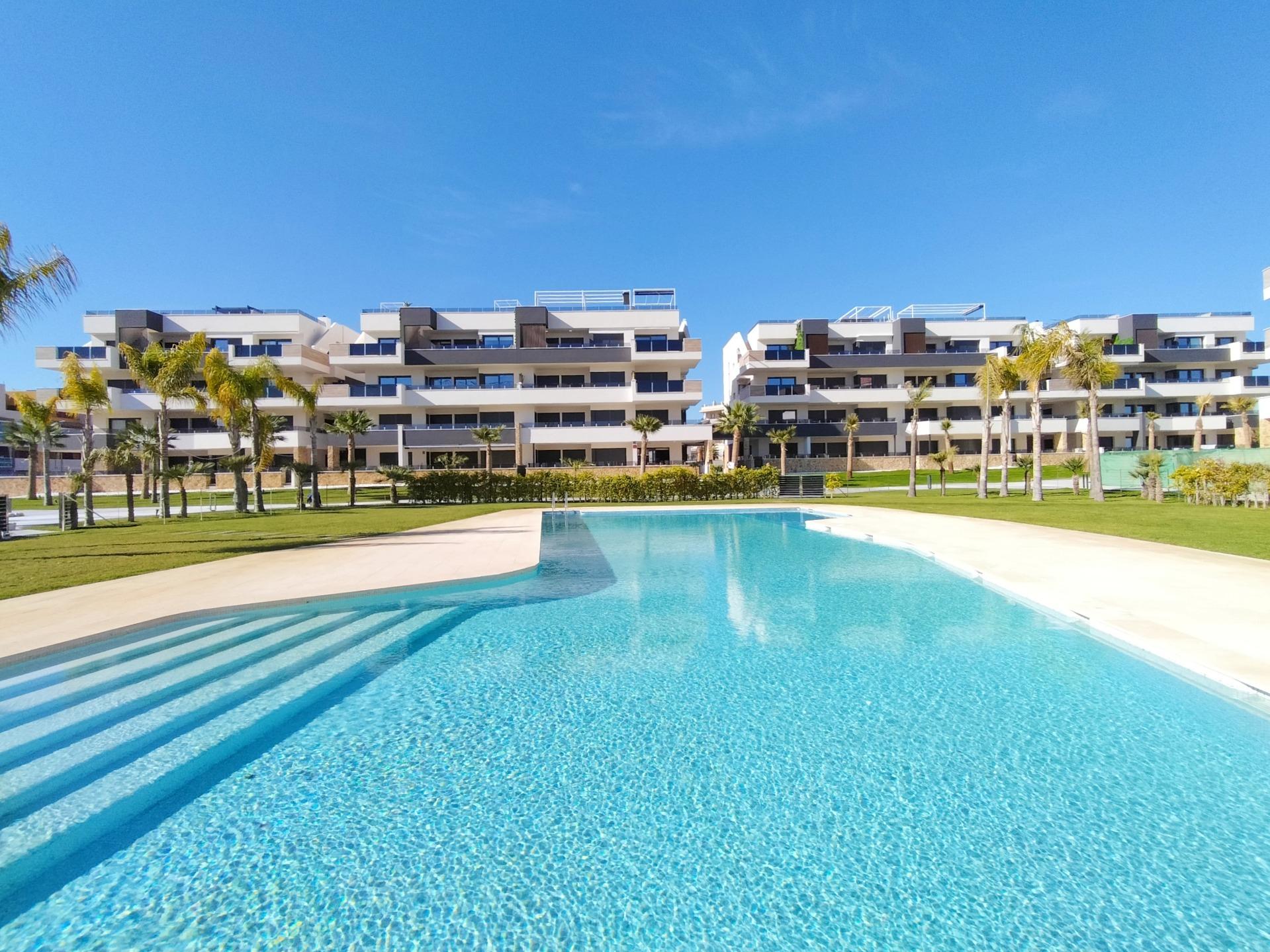 Pool area in apartment for sale in Orihuela Costa