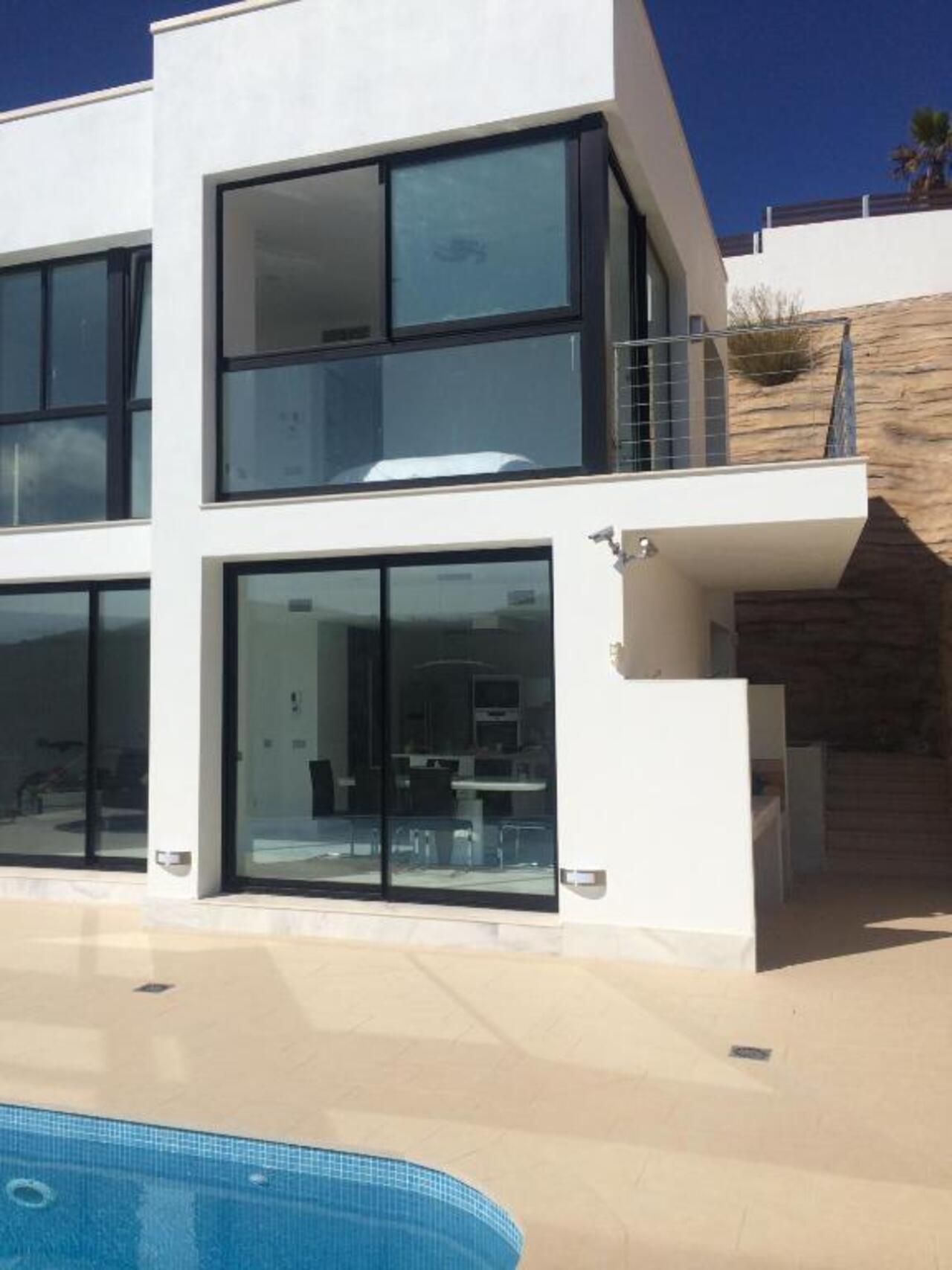 Spectacular First-Line 4-Bedroom Villa with Sea Views Near Granadella BeachNestled in an exclusive a