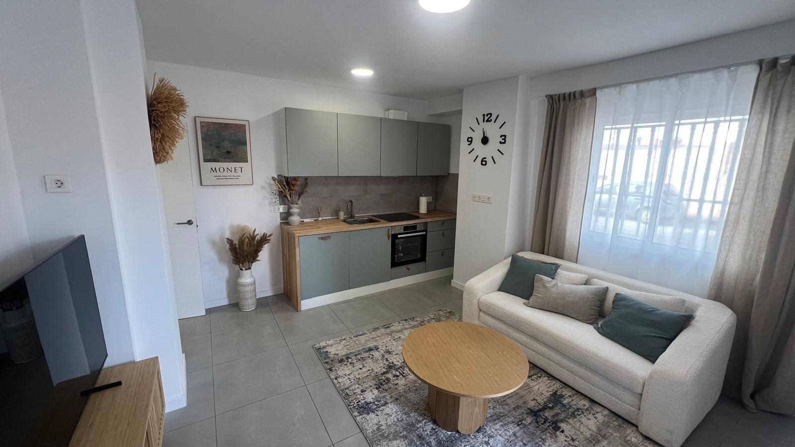 Located in one of Torrevieja's most desirable areas, this renovated ground-floor apartment at Calle