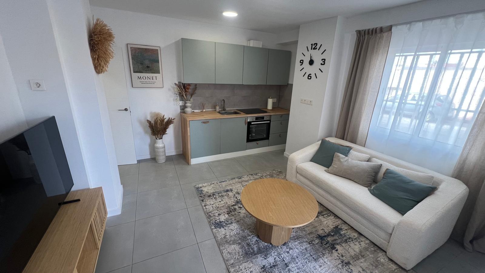 Located in one of Torrevieja's most desirable areas, this renovated ground-floor apartment at Calle