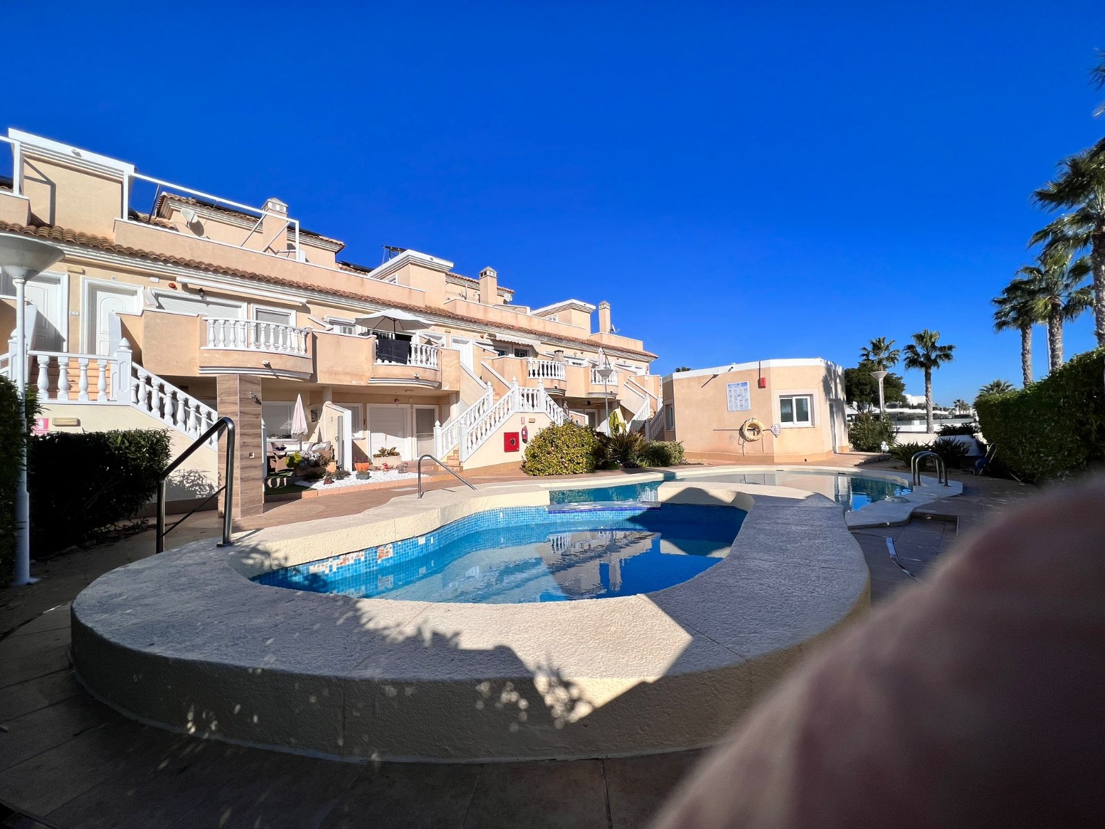 Pool area in apartment for sale in Guardamar del Segura