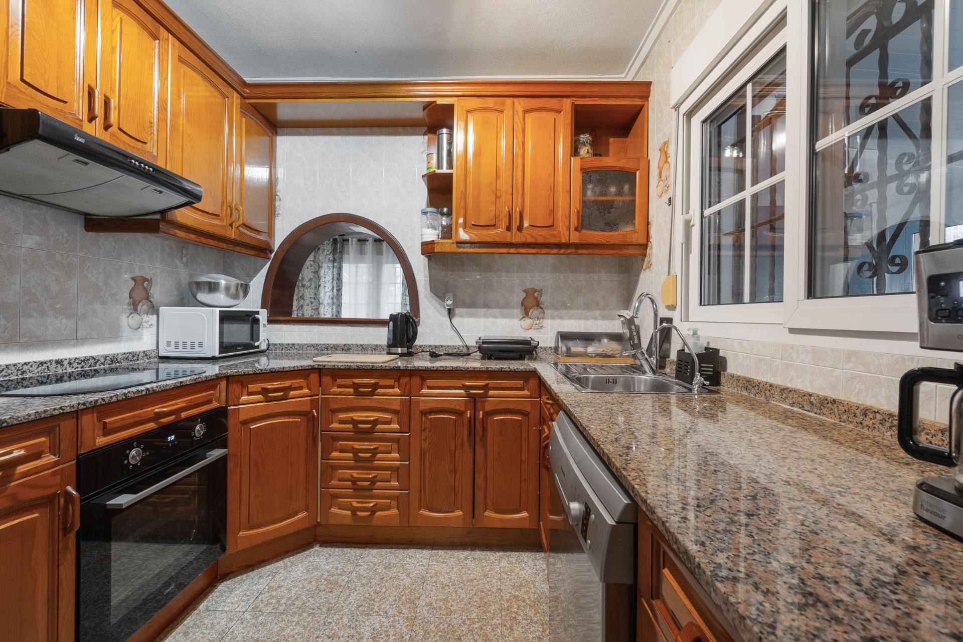 Pool area in villa for sale in Torrevieja