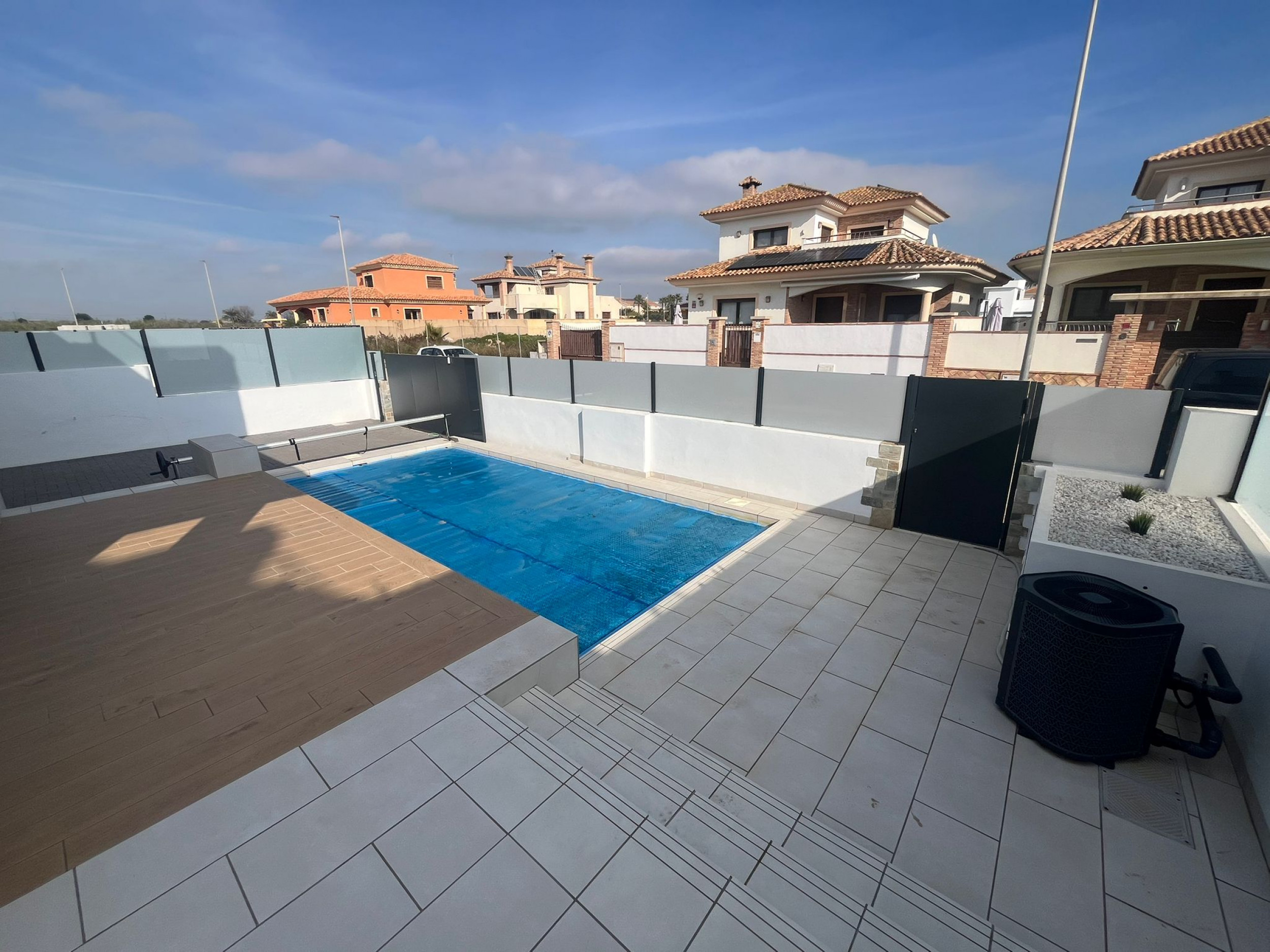 Pool area in villa for sale in Los Alcazares