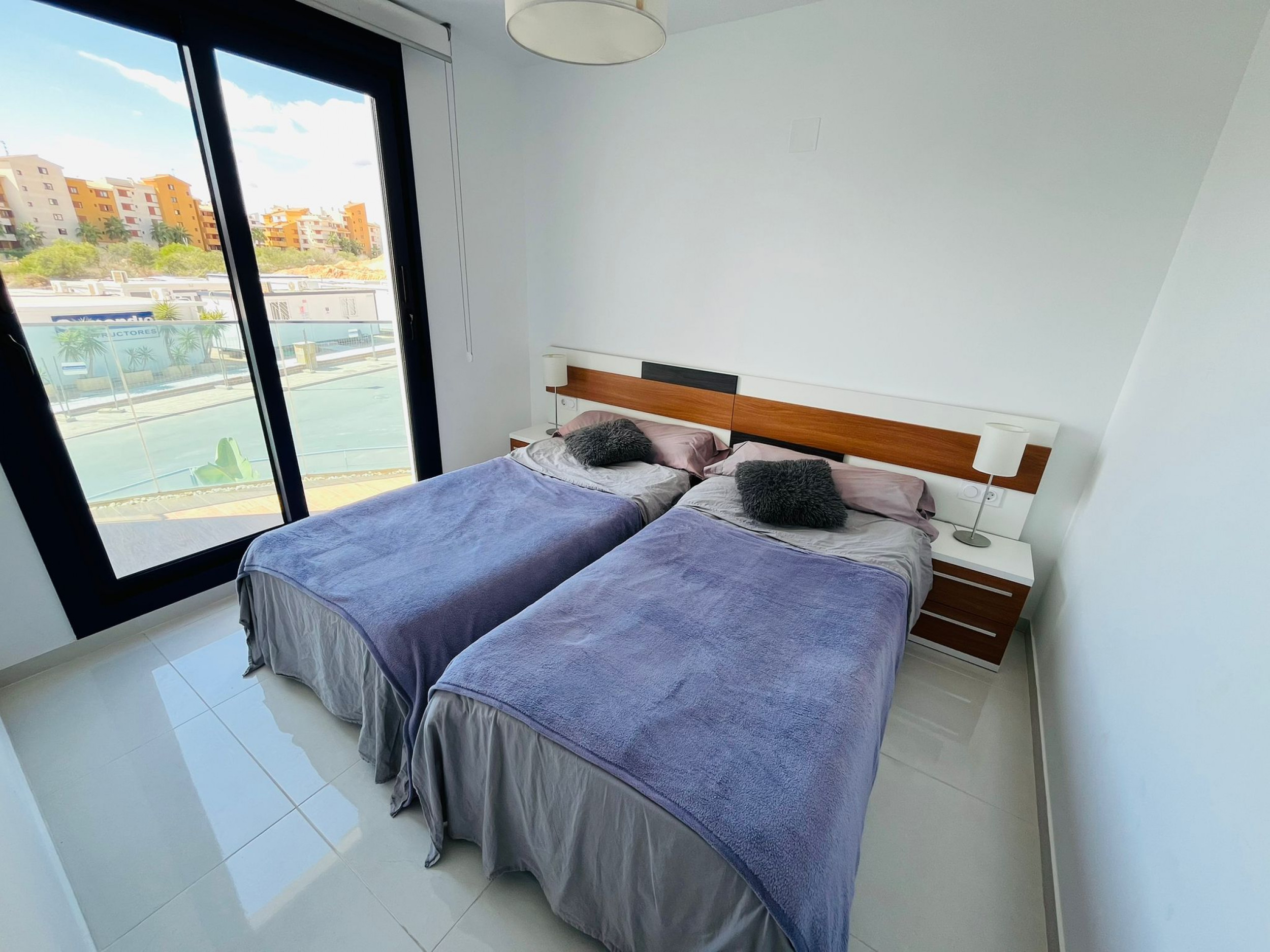 Living room in apartment for sale in Punta Prima