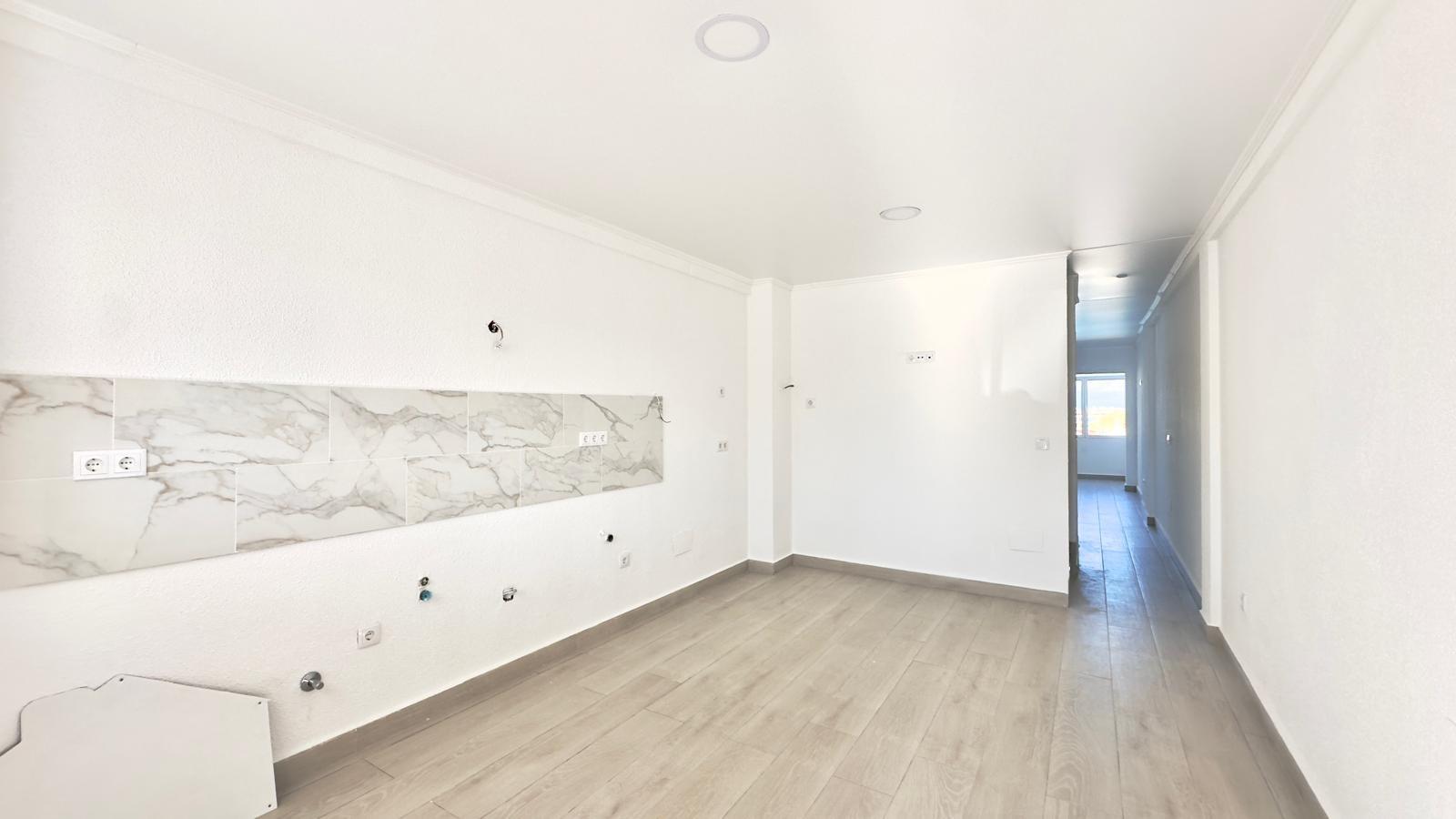 This three-story townhouse with a basement on Avenida Torreblanca is designed as a home with its own