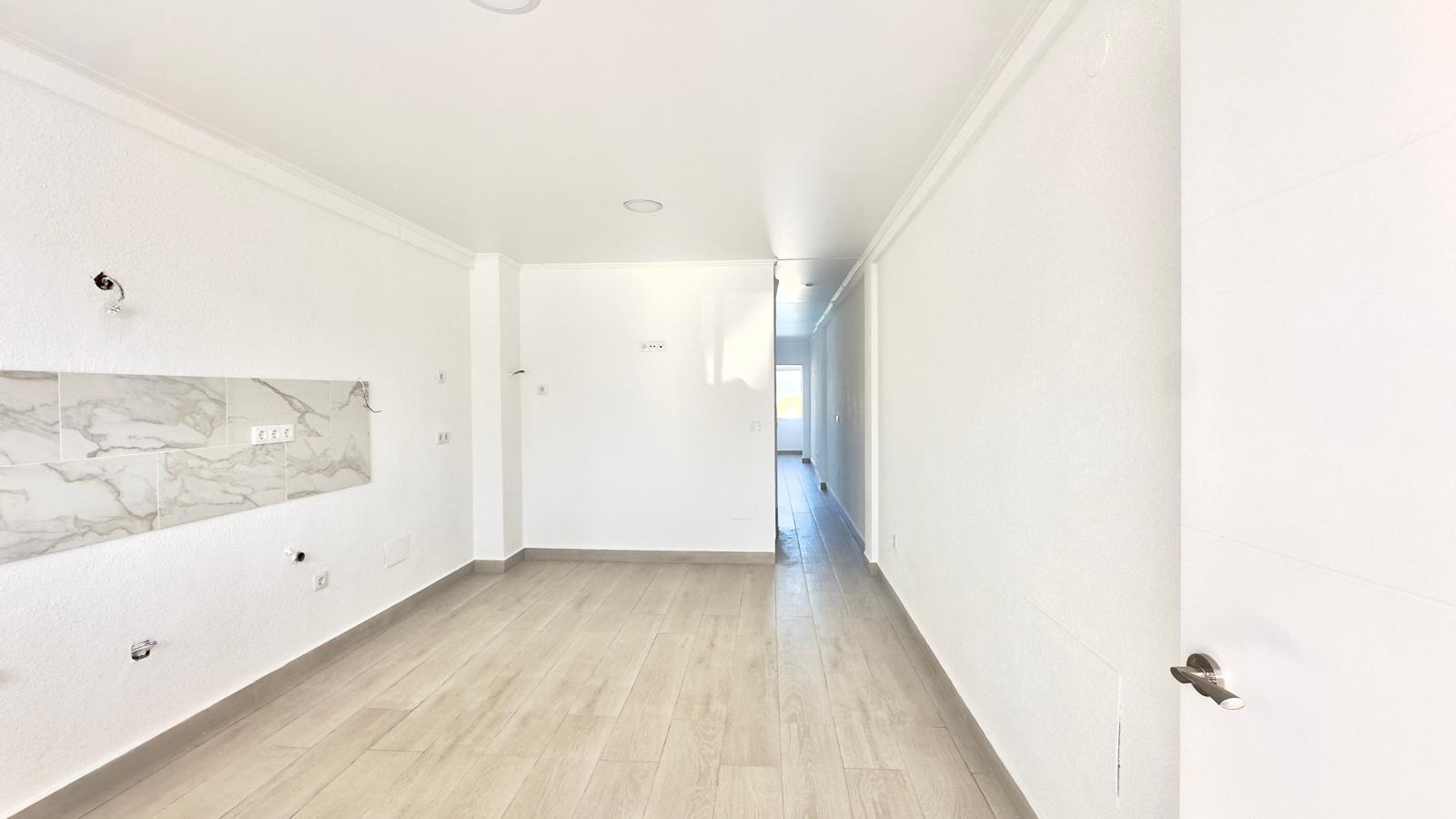 This three-story townhouse with a basement on Avenida Torreblanca is designed as a home with its own