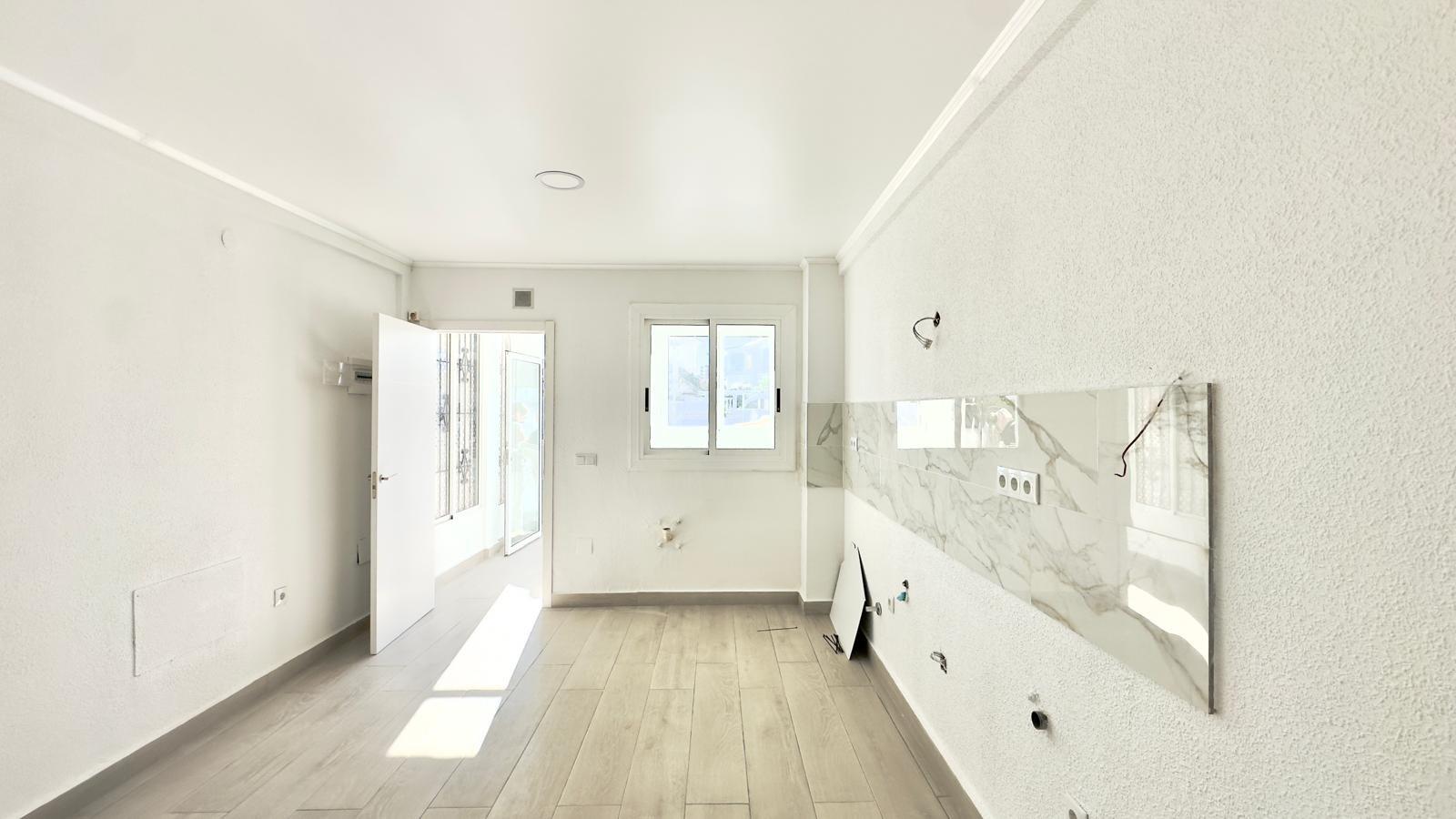 This three-story townhouse with a basement on Avenida Torreblanca is designed as a home with its own