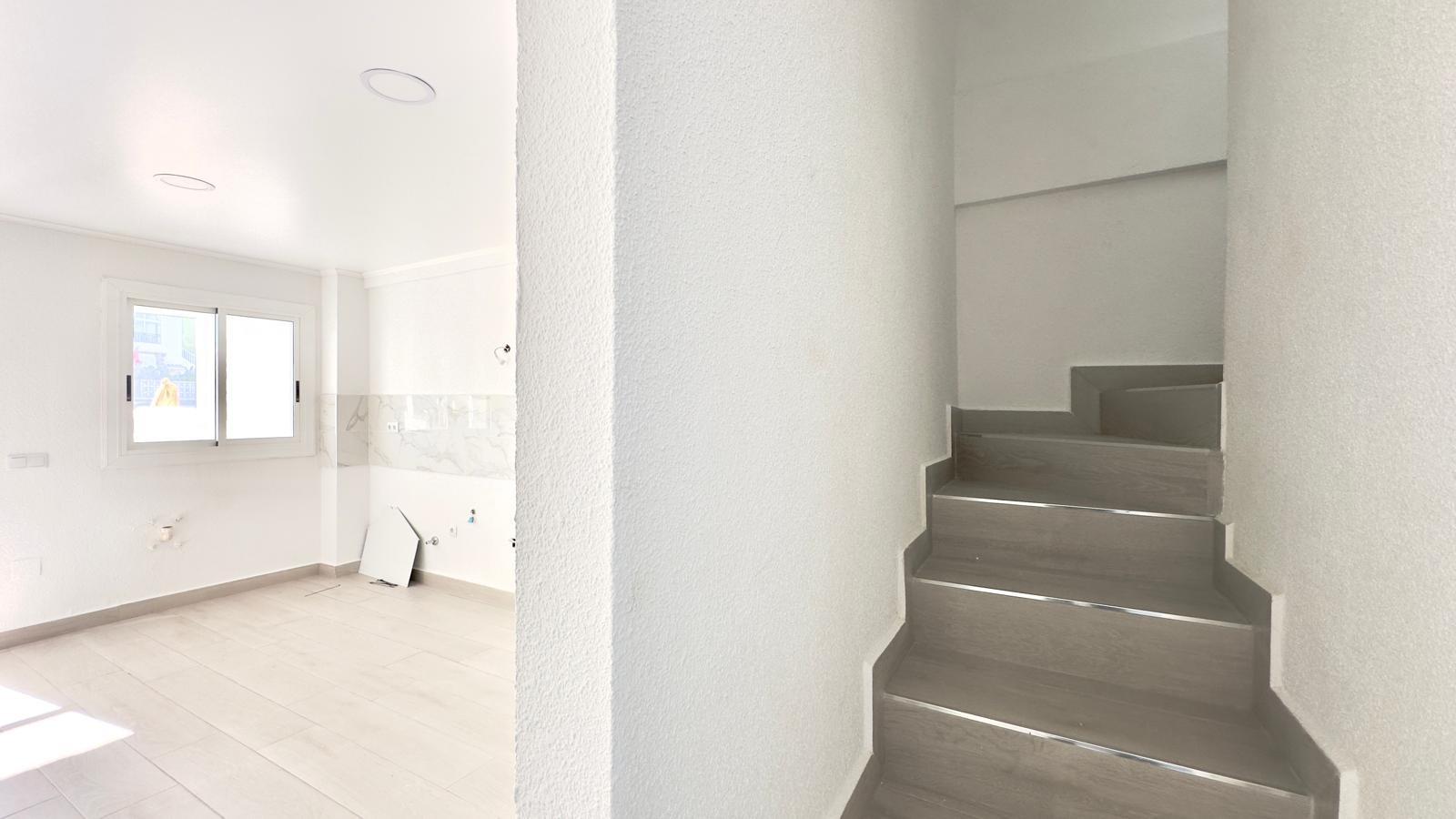 This three-story townhouse with a basement on Avenida Torreblanca is designed as a home with its own