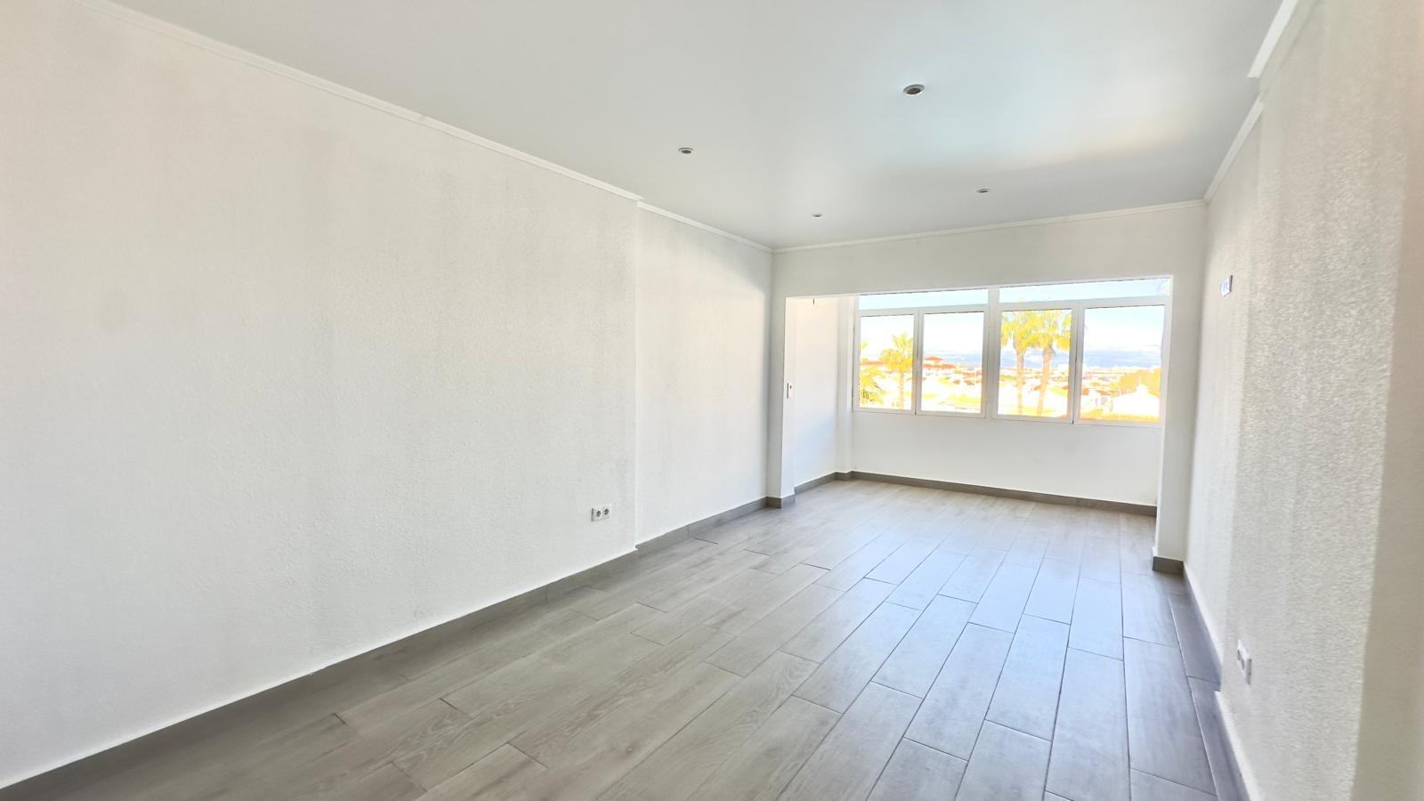 This three-story townhouse with a basement on Avenida Torreblanca is designed as a home with its own