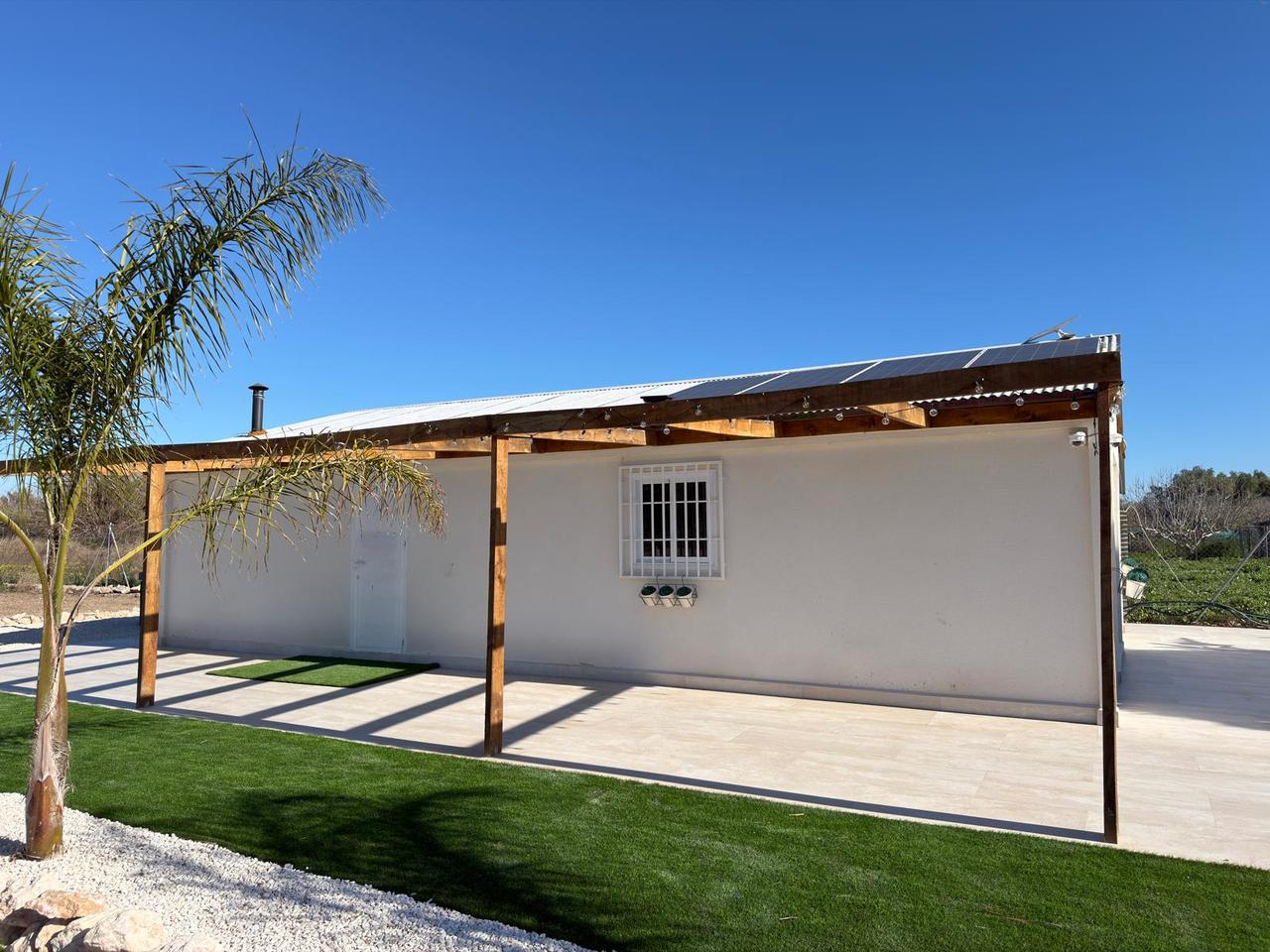 Living room in land for sale in Algorfa