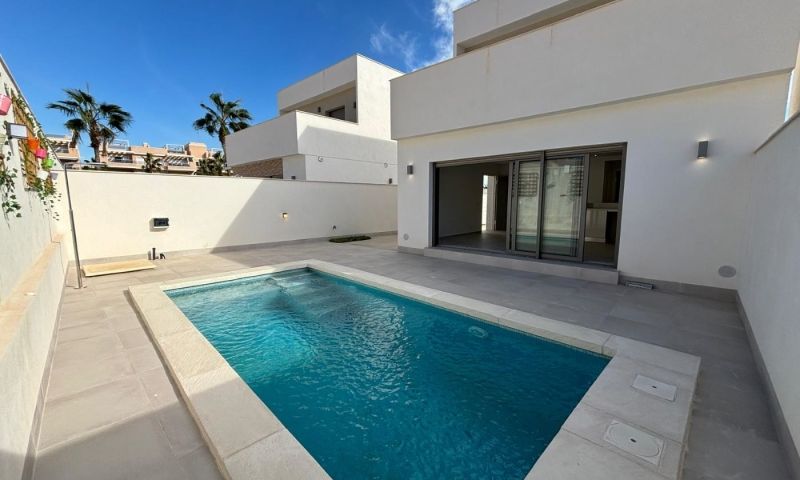 Pool area in villa for sale in Orihuela Costa