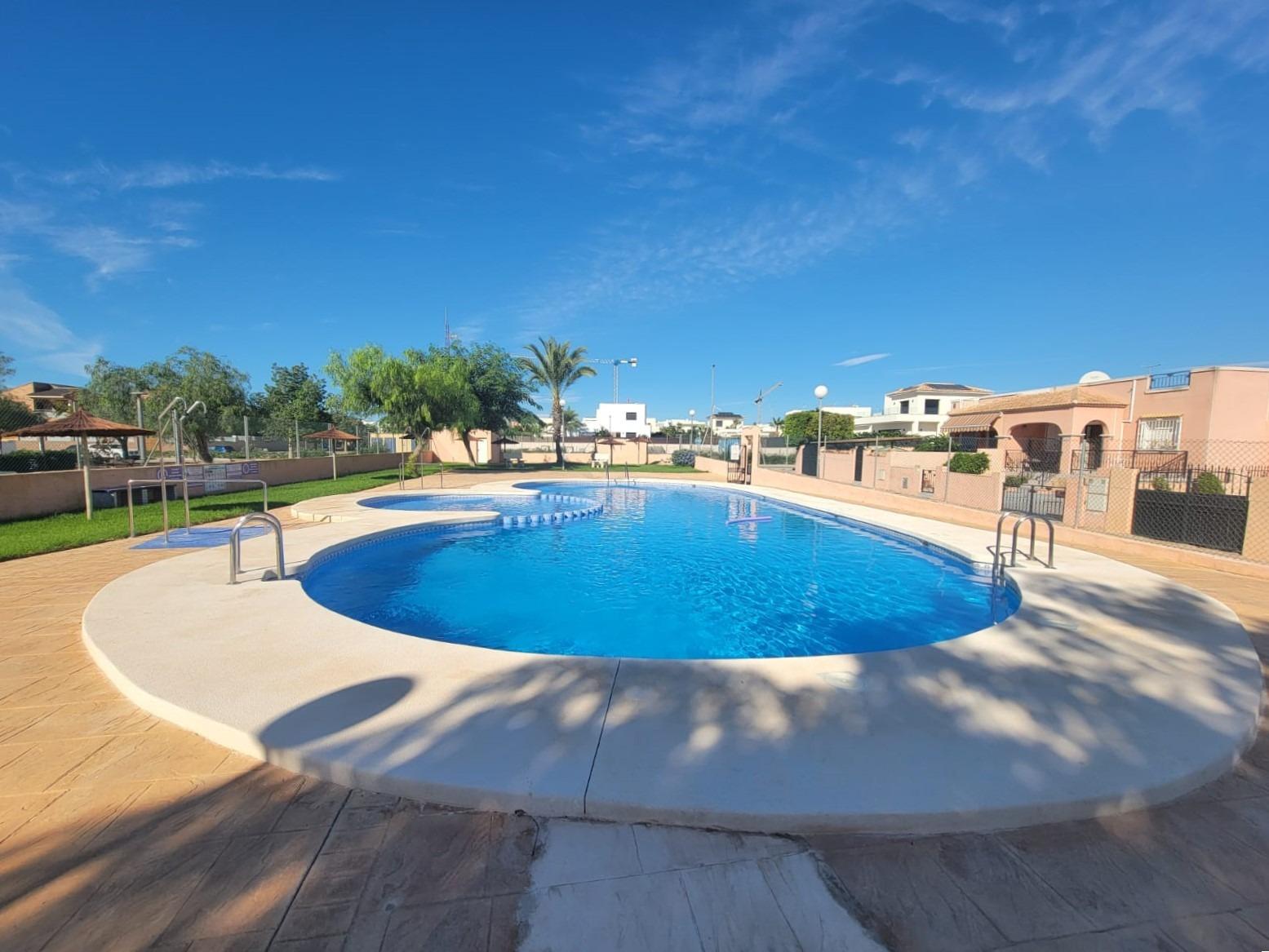 Pool area in terraced for sale in Los Montesinos