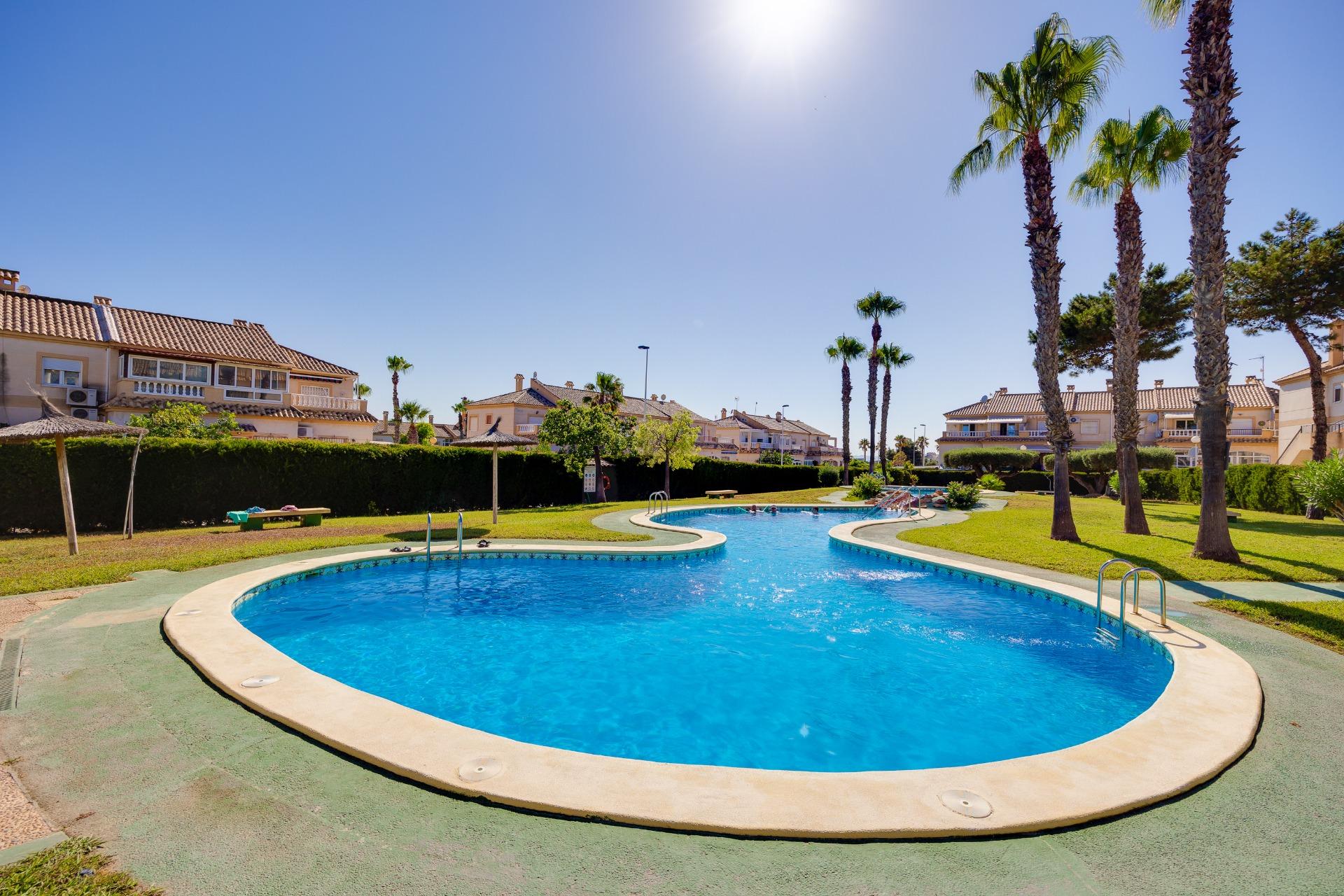 Pool area in bungalow for sale in Torrevieja