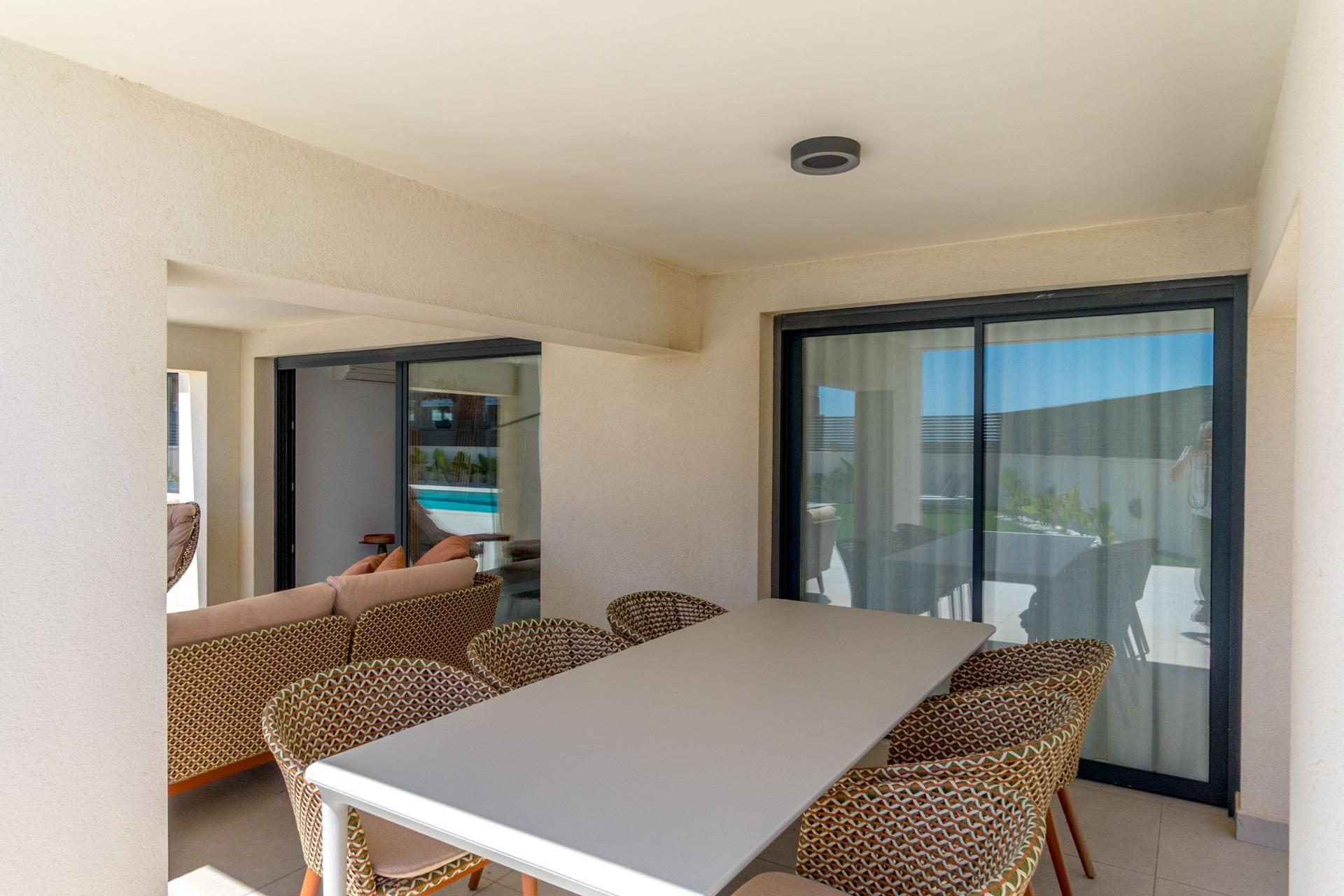 Pool area in villa for sale in Torrevieja