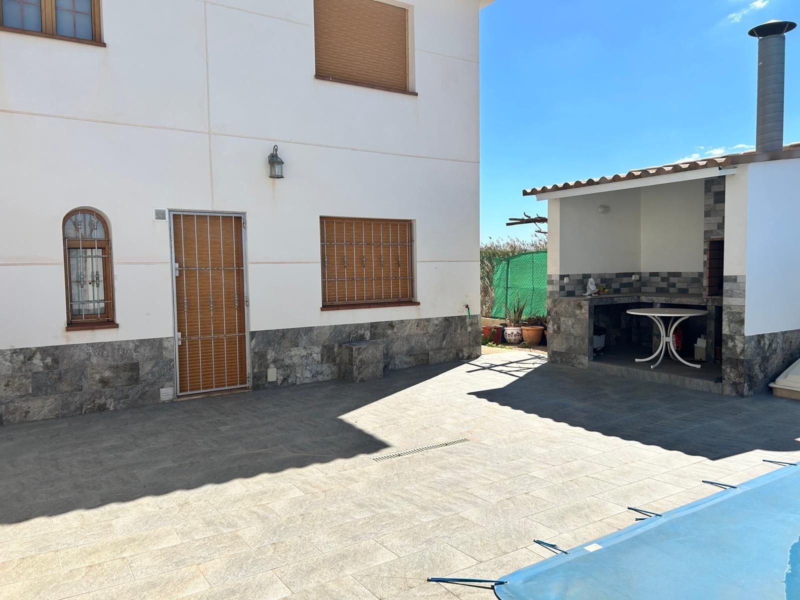 Pool area in villa for sale in Los Alcazares